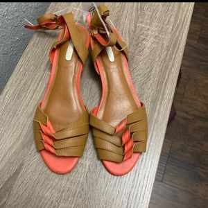 Mark
Orange & Tan summer Sandals